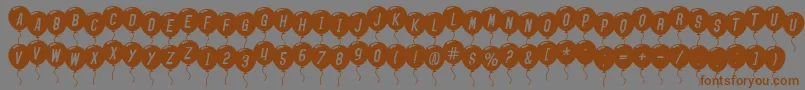 Weitere Informationen zur SfBalloonsItalic-Schriftart SfBalloonsItalic-Schriftart – Braune Schriften auf grauem Hintergrund