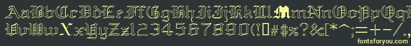 フォントYolda – 黒い背景に黄色の文字