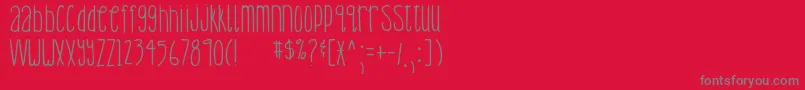 DjbLemonHead-Schriftart – Graue Schriften auf rotem Hintergrund