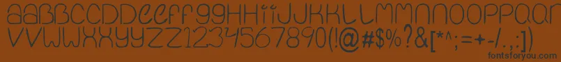 QuietInfinity Font – Black Fonts on Brown Background
