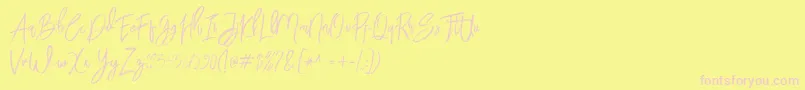 BloomyScriptFree-Schriftart – Rosa Schriften auf gelbem Hintergrund