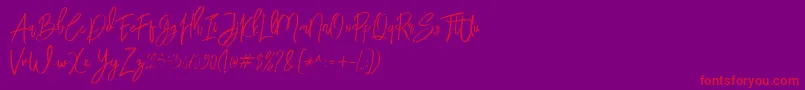 BloomyScriptFree Font – Red Fonts on Purple Background