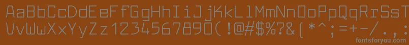 フォントLarabiefontrgRegular – 茶色の背景に灰色の文字