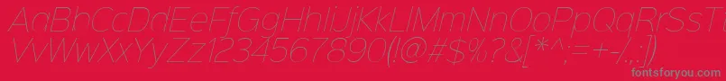Fonte Sinkinsans100thinitalic – fontes cinzas em um fundo vermelho