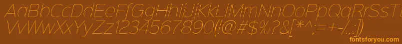 Sinkinsans100thinitalic-fontti – oranssit fontit ruskealla taustalla