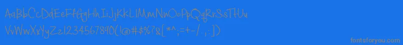 BmdCashewAppleAle-fontti – harmaat kirjasimet sinisellä taustalla