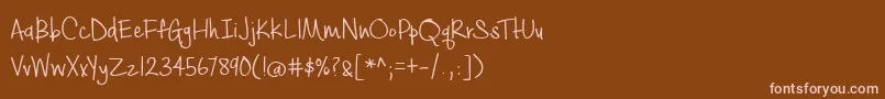 BmdCashewAppleAle-fontti – vaaleanpunaiset fontit ruskealla taustalla