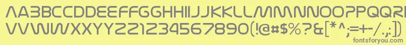 フォントNasalizationltRegular – 黄色の背景に灰色の文字