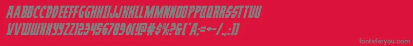 フォントProwlerital – 赤い背景に灰色の文字