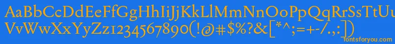 フォントJannonTModerneOt – オレンジ色の文字が青い背景にあります。