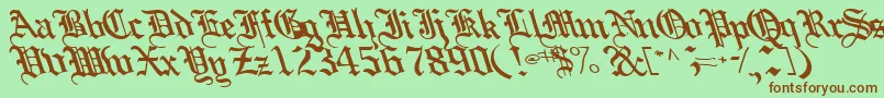 Boobshelltext125Bold-fontti – ruskeat fontit vihreällä taustalla