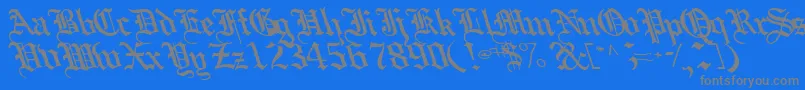 Boobshelltext125Bold-fontti – harmaat kirjasimet sinisellä taustalla