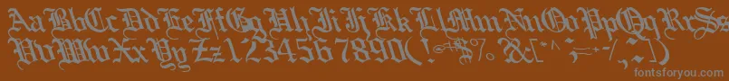 Boobshelltext125Bold-Schriftart – Graue Schriften auf braunem Hintergrund