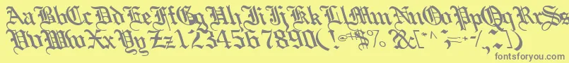 Boobshelltext125Bold-fontti – harmaat kirjasimet keltaisella taustalla
