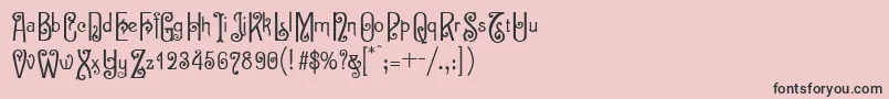 フォントSevilla – ピンクの背景に黒い文字