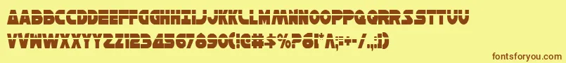 フォントHanSoloCondensedLaser – 茶色の文字が黄色の背景にあります。