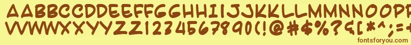 フォントKarab – 茶色の文字が黄色の背景にあります。