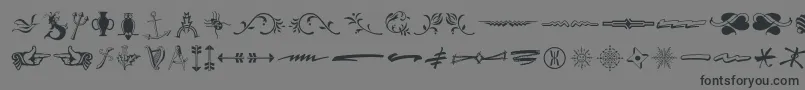 フォントTypeembellishmentsthree – 黒い文字の灰色の背景