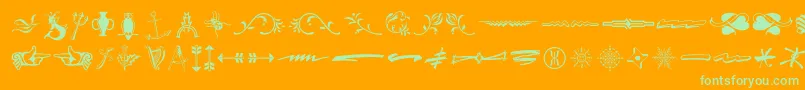 Typeembellishmentsthree-Schriftart – Grüne Schriften auf orangefarbenem Hintergrund