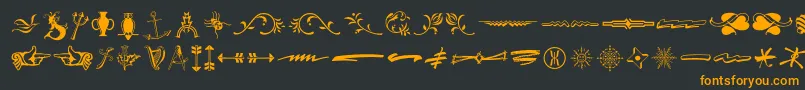 フォントTypeembellishmentsthree – 黒い背景にオレンジの文字