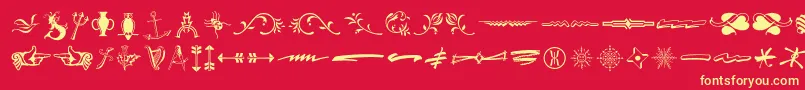 フォントTypeembellishmentsthree – 黄色の文字、赤い背景