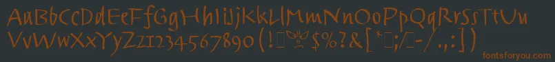 fuente TrackpadLetPlain.1.0 – Fuentes Marrones Sobre Fondo Negro