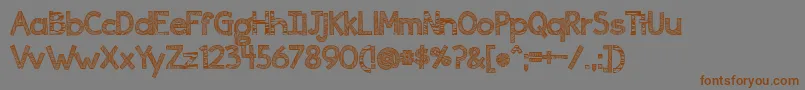 Ingrained Font – Brown Fonts on Gray Background