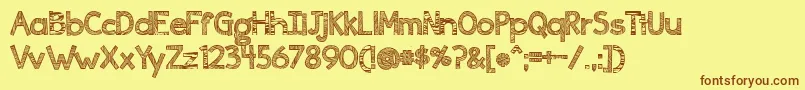 Ingrained Font – Brown Fonts on Yellow Background
