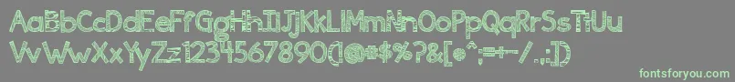 Ingrained Font – Green Fonts on Gray Background