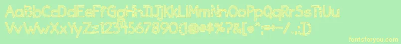 Ingrained Font – Yellow Fonts on Green Background