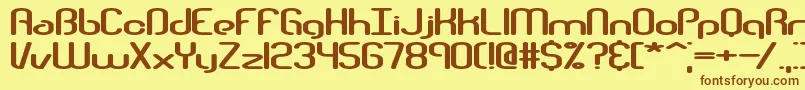 フォントTelephasicBrk – 茶色の文字が黄色の背景にあります。