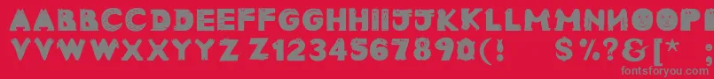 Fonte Animaltypefaces – fontes cinzas em um fundo vermelho