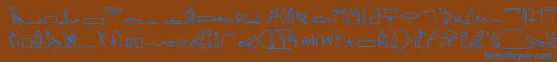 PharoahGlyphMedium Font – Blue Fonts on Brown Background