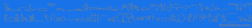 フォントPharoahGlyphMedium – 青い背景に灰色の文字