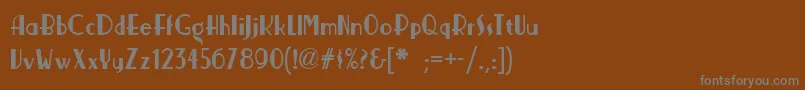 フォントNickerbocker – 茶色の背景に灰色の文字