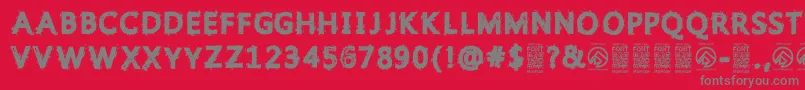 フォントGristledfontRegular – 赤い背景に灰色の文字