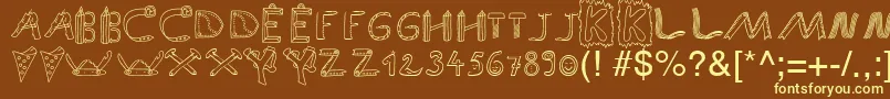 SpAnlaut9Db-fontti – keltaiset fontit ruskealla taustalla