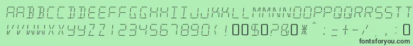 MinisystemRegular-fontti – mustat fontit vihreällä taustalla
