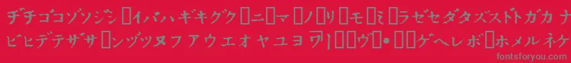 フォントInKatak – 赤い背景に灰色の文字