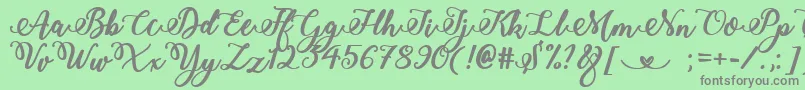 BoldStylishCalligraphy Font – Gray Fonts on Green Background