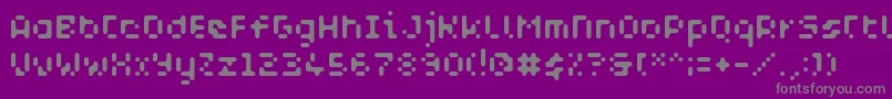 WcAquabluesBta-fontti – harmaat kirjasimet violetilla taustalla