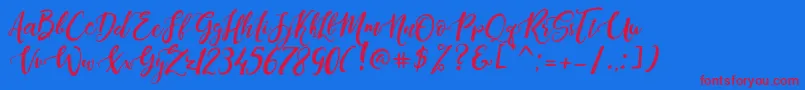 DandeleonVintageDemo Font – Red Fonts on Blue Background