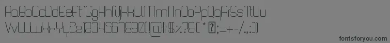 フォントQuattroLight – 黒い文字の灰色の背景