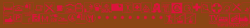 フォントLinotypeHolidayPi3 – 赤い文字が茶色の背景にあります。