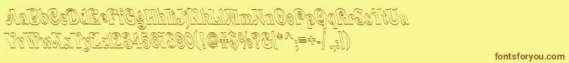 フォントQuardi – 茶色の文字が黄色の背景にあります。