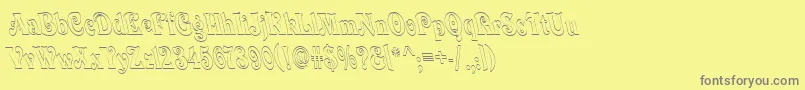 フォントQuardi – 黄色の背景に灰色の文字