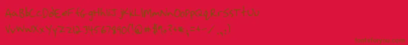 StrassmanScript-Schriftart – Braune Schriften auf rotem Hintergrund