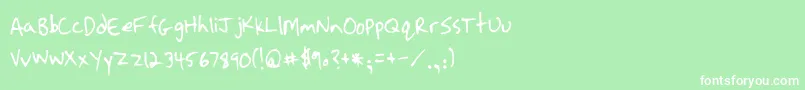 フォントStrassmanScript – 緑の背景に白い文字