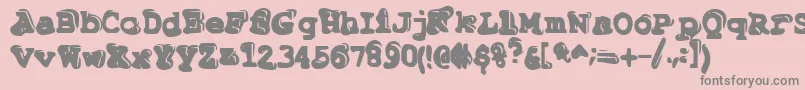 フォントTiptonian – ピンクの背景に灰色の文字