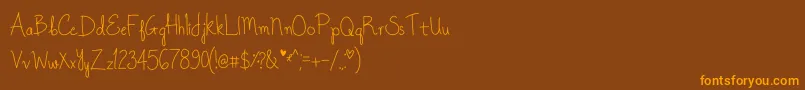 OnceUponADream Font – Orange Fonts on Brown Background